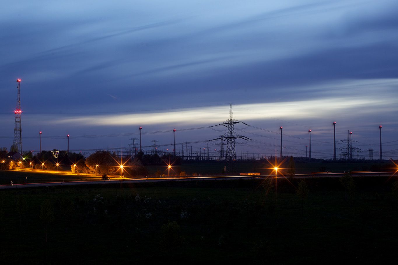 Illuminated substation at night